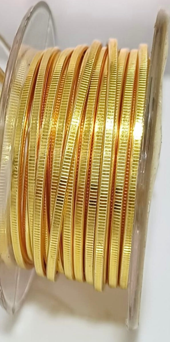 Gold-colored textured Flat wire, Hammered and Nidus model. Collection 2024. Specially designed for wire wrapping.