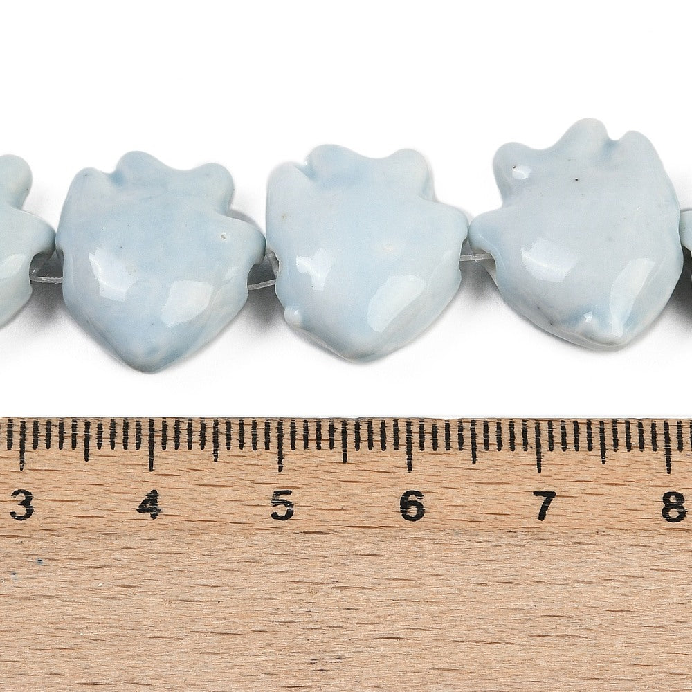 Fish-shaped glass beads, assorted colors.
