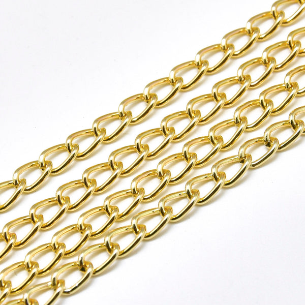 Chain Aluminum, golden, smooth with spool,, 7x4x1 mm (5mts)