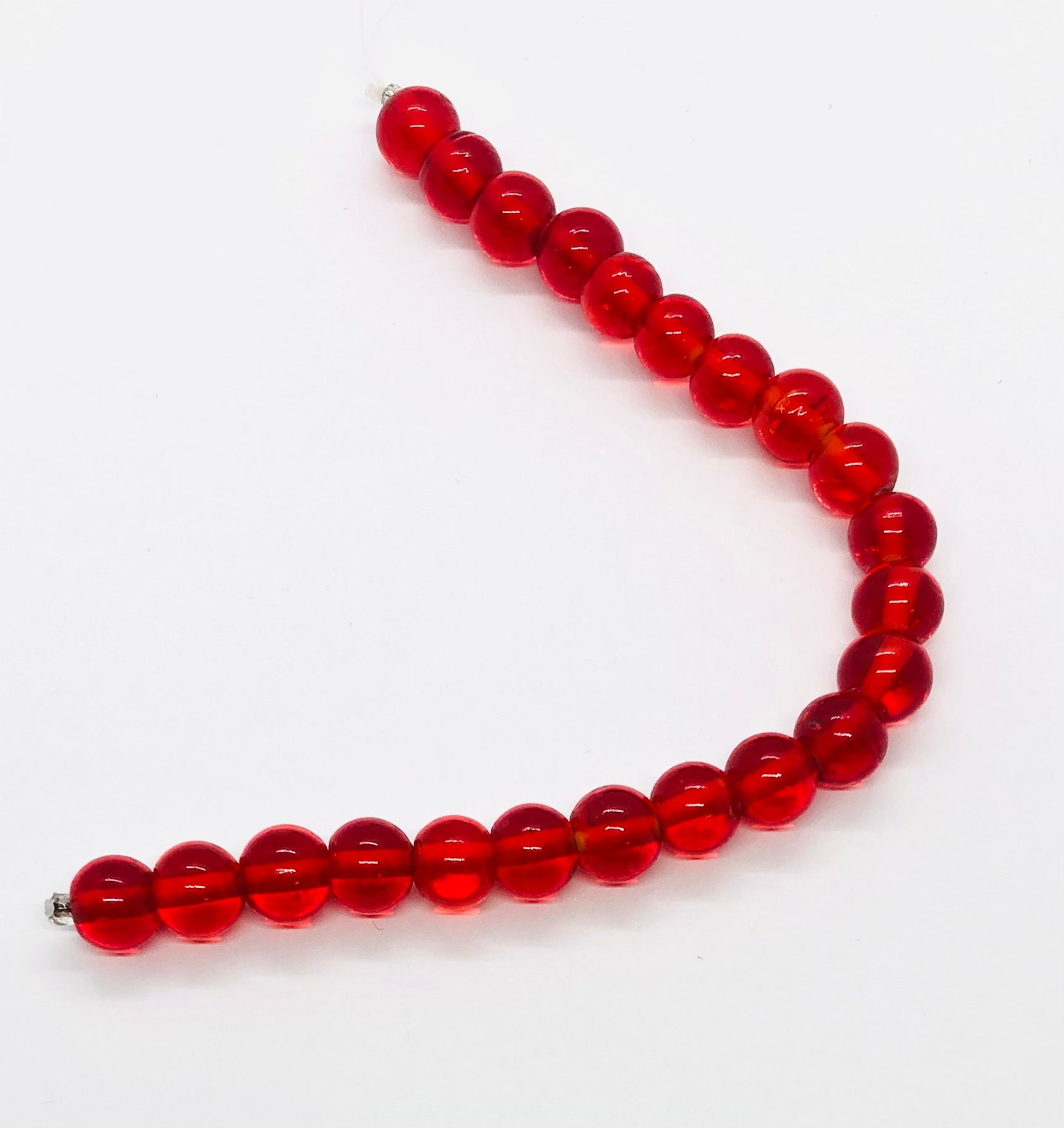 Tiras translúcidas rojas de cristal de Murano