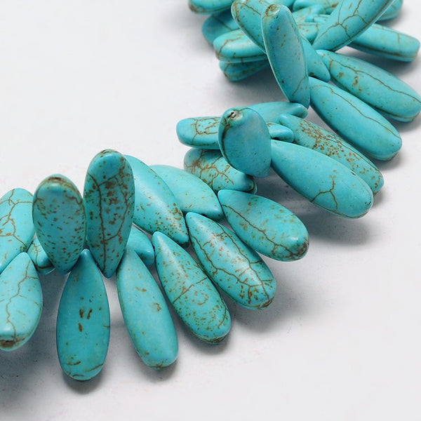 LONG DROPS OF SYNTHETIC TURQUOISE