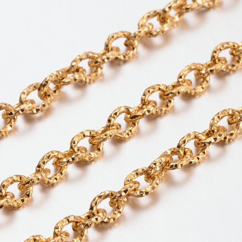 Chain Aluminum Golden Oval Textured 7x6x1.5mm x 2mts