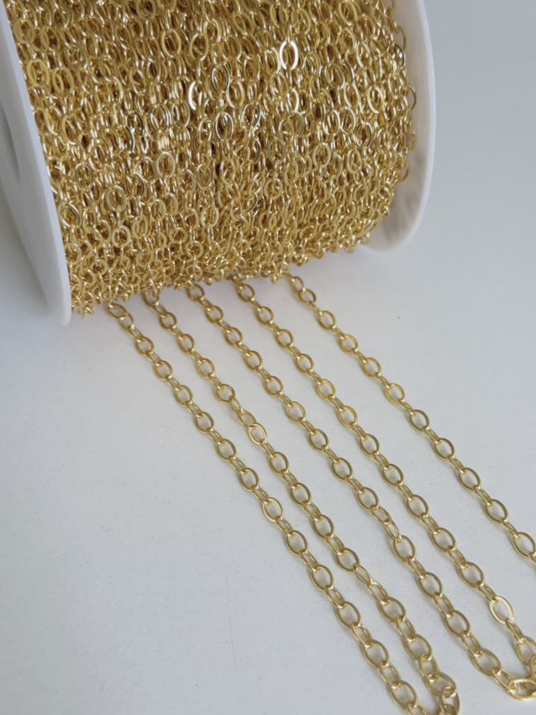 Gold Color Chain for Jewelry Making by the Meter. Oval 5.8 x 3.7 x 0.7mm  Hole 3.8 x 2.5 mm