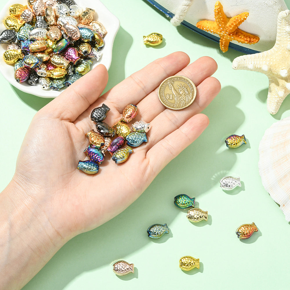 Fish-shaped glass beads, assorted colors.