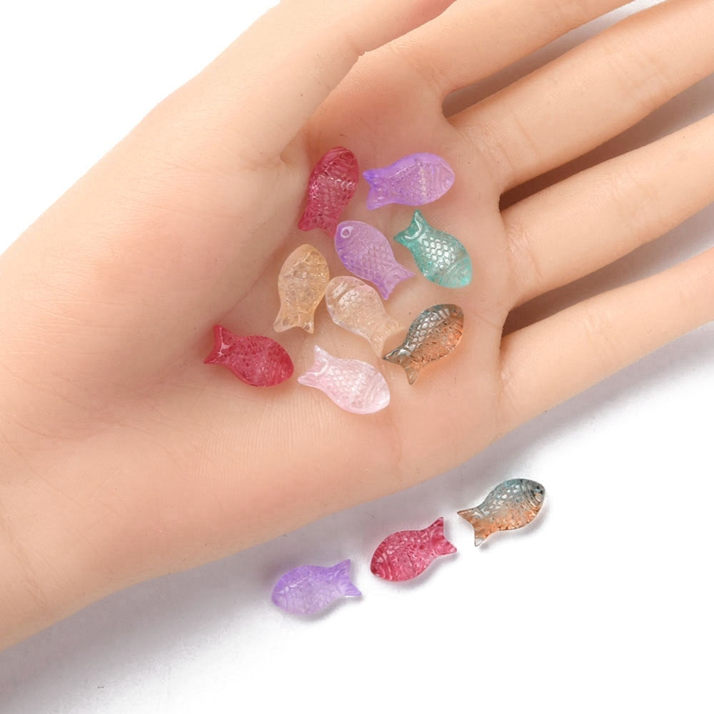 Fish-shaped glass beads, assorted colors.
