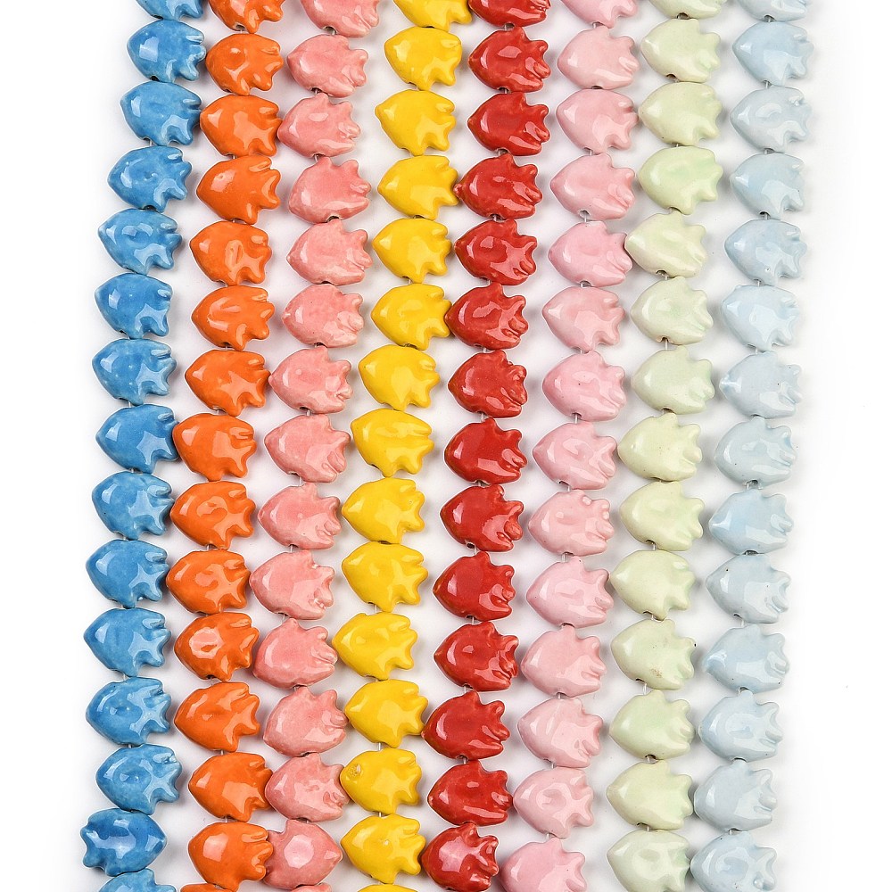 Fish-shaped glass beads, assorted colors.