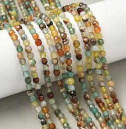 Round natural agate strips. faceted. 4mm