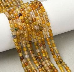 Round natural agate strips. faceted. 4mm